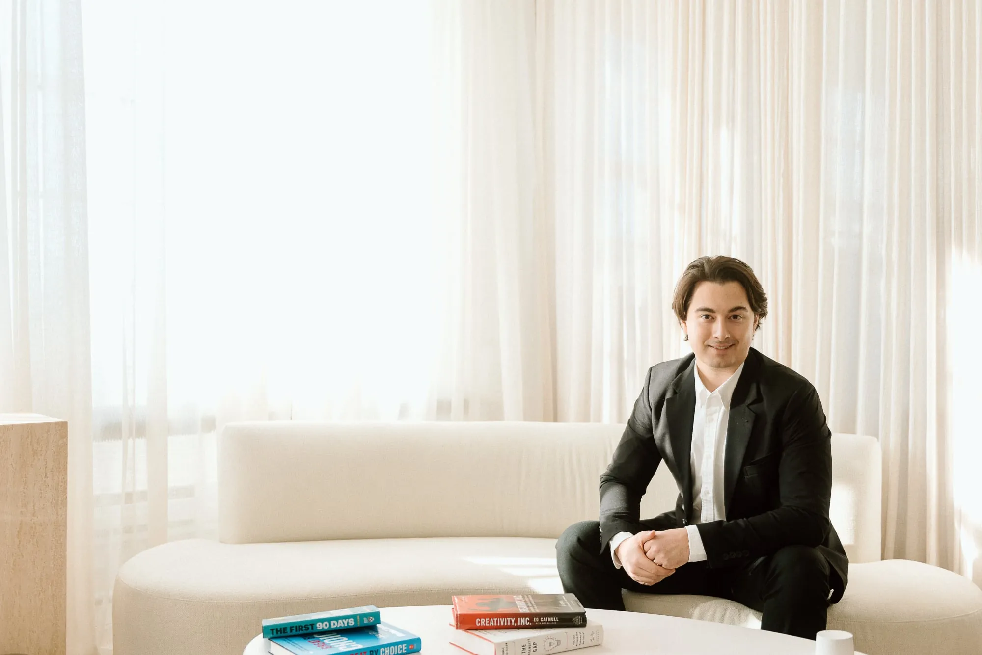 Vitalijs Arkulinskis in a bright, relaxed meeting space